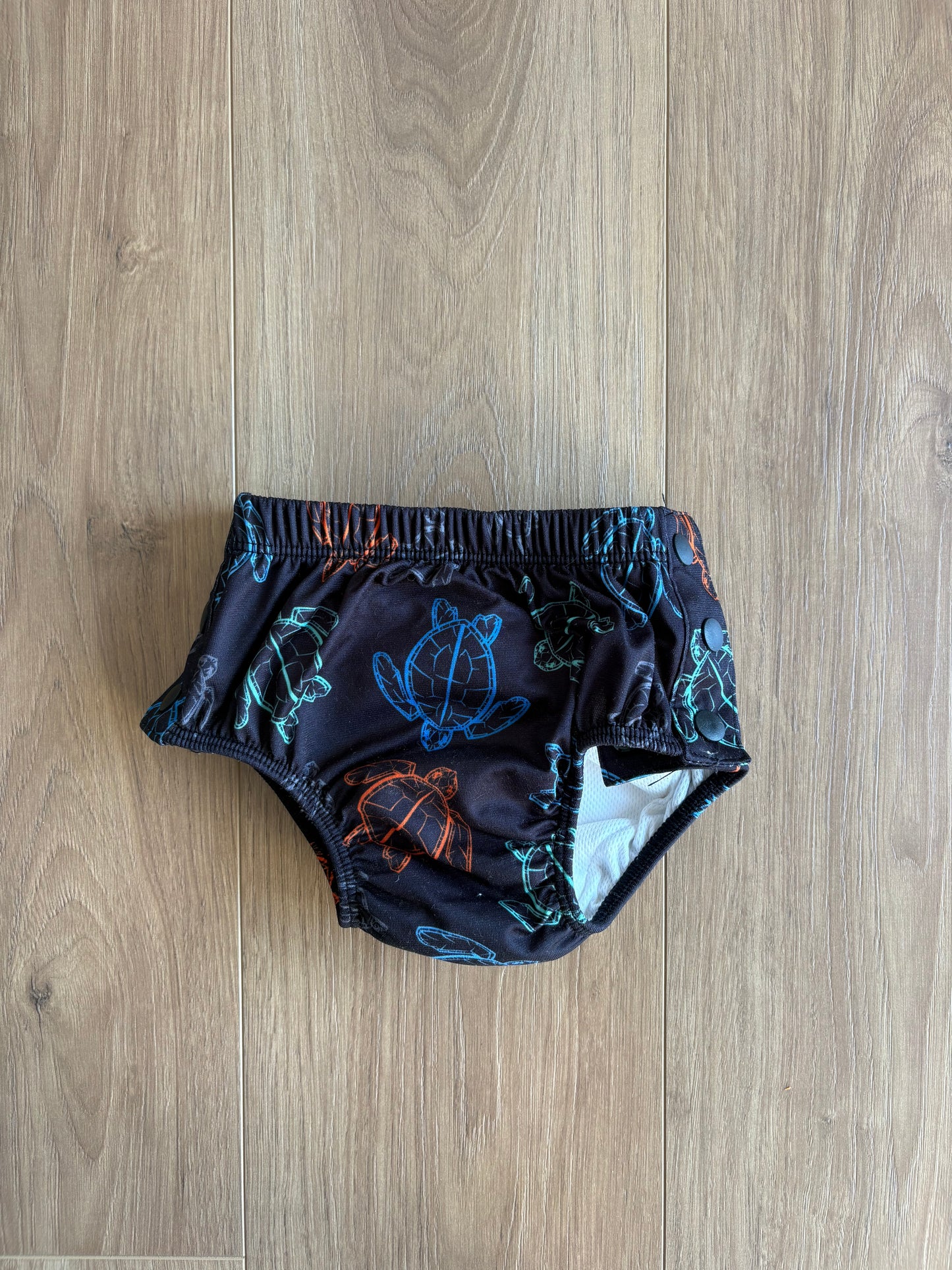 Couche de piscine - Tag - 6/12 mois
