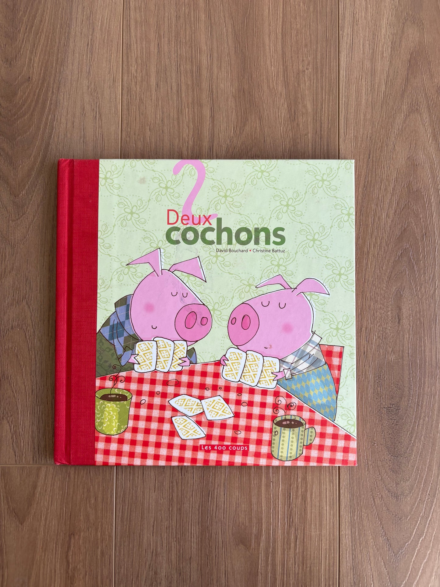 *Petite imperfection couverture* Deux cochons