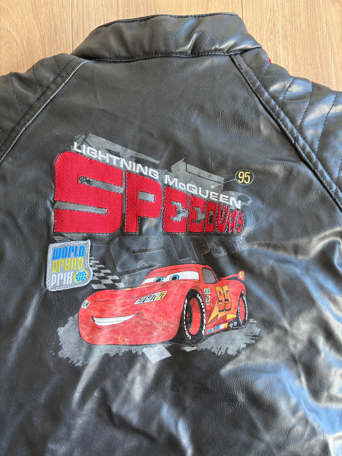 *léger imparfait* Manteau effet cuir, intérieur polar  - Disney X Cars - 4 ans (voir les autres photos)